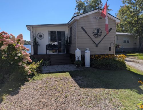 2013 – 38’ General Coach Huron Ridge with 3 Season Room & Hardtop Overhang. Asking: $145,000